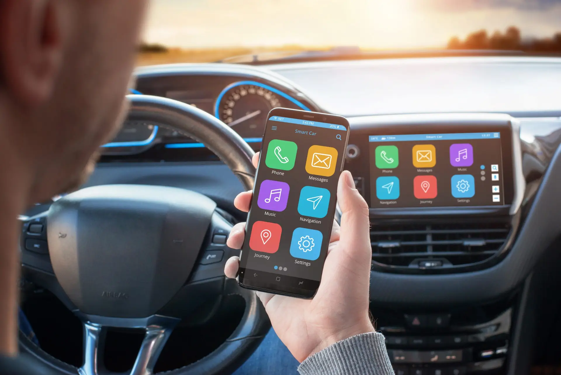 A person in a car holds a smartphone displaying a smart car app, featuring icons for phone, messages, music, navigation, and settings. The dashboard screen mirrors these controls. Sunlight streams through the windshield, prompting thoughts about safety with tech in smart cars.