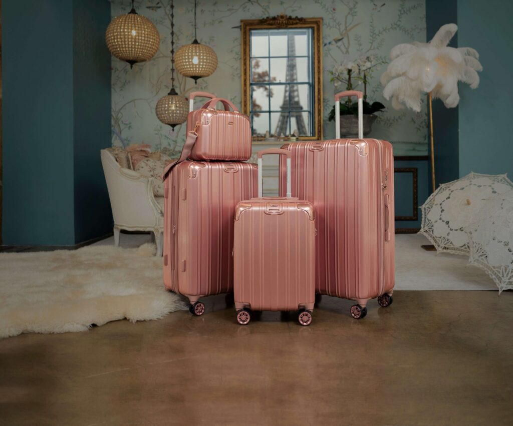 pink luggage in a room in paris