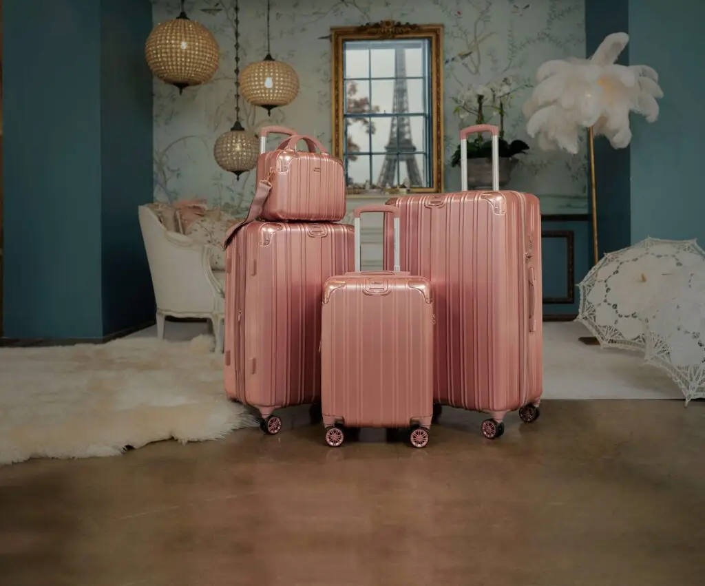 pink luggage in a room in paris