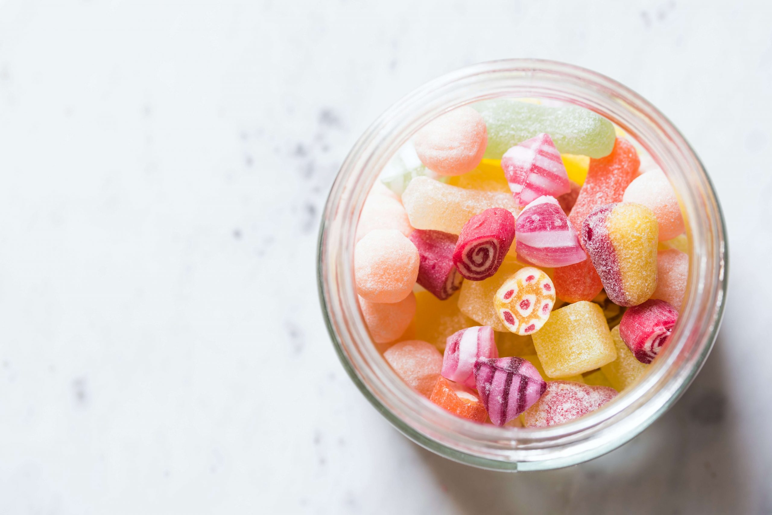 close up of candy sweets in a jar