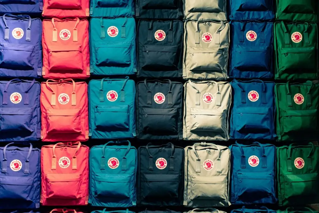 a bunch of fjallraven backpacks in different colors