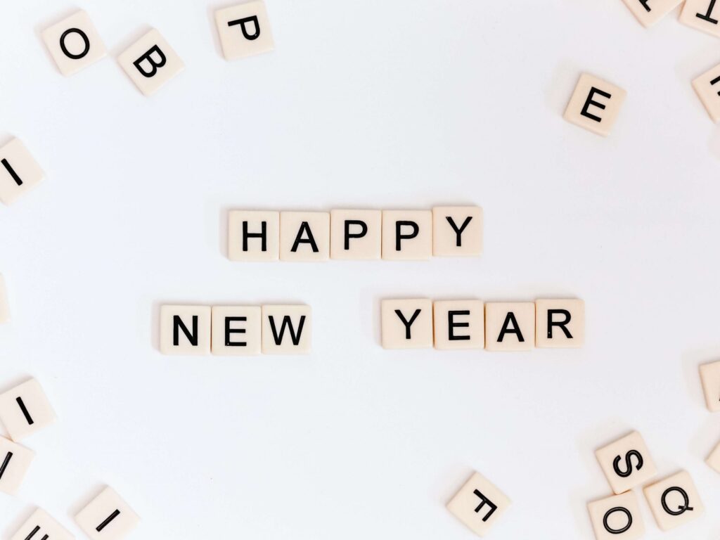 scrabble letter spelling happy new year