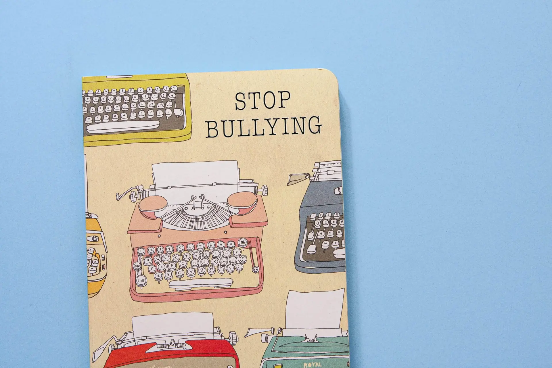 stop bullying journal with typewriters on cover