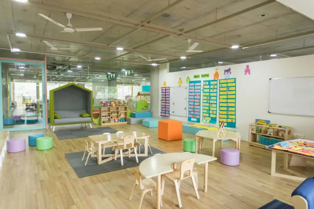 preschool classroom with desks and chairs