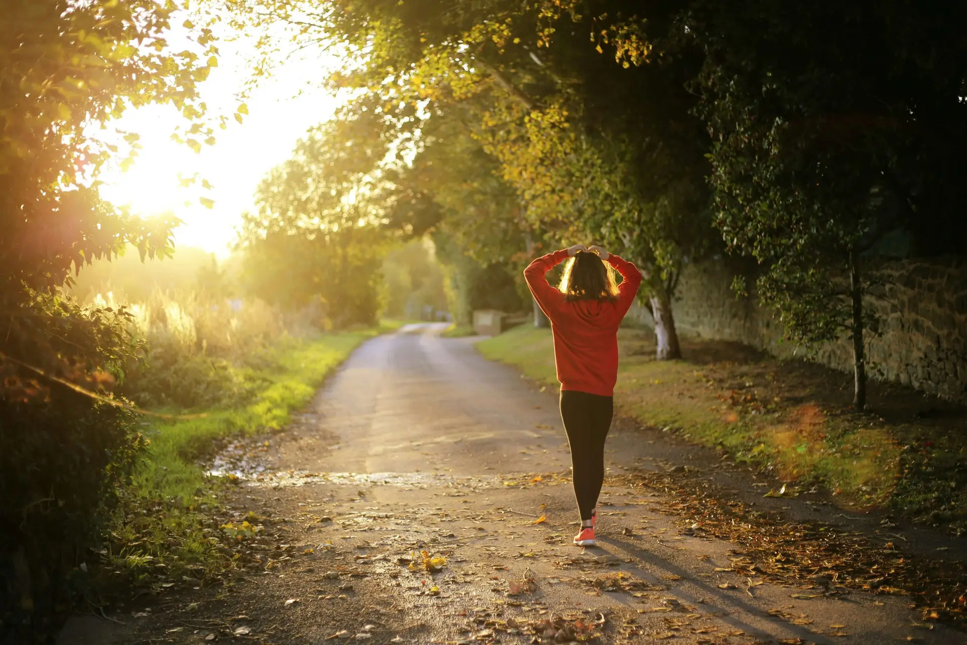 teenager walking on a trail