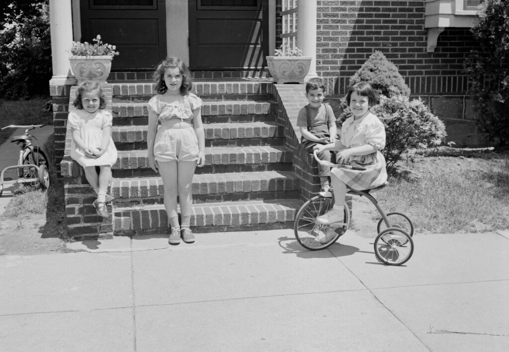 black and white photo of kids in boston