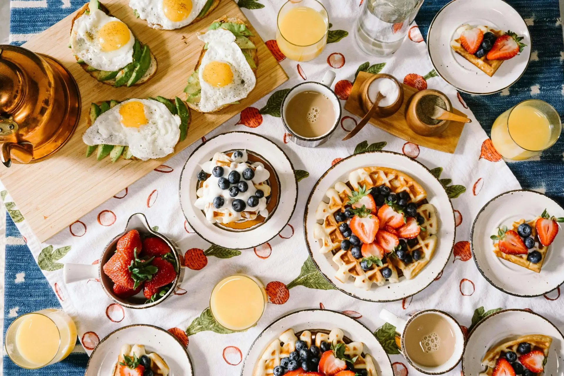 breakfast foods spread out on a table