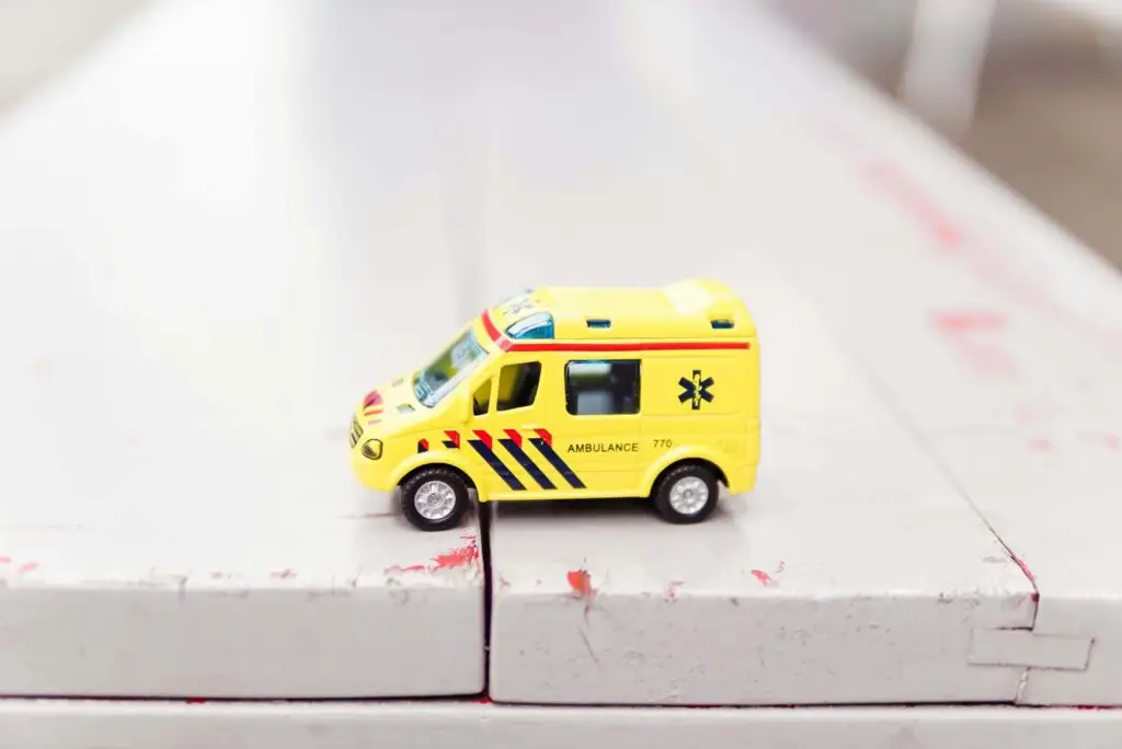 yellow toy ambulance