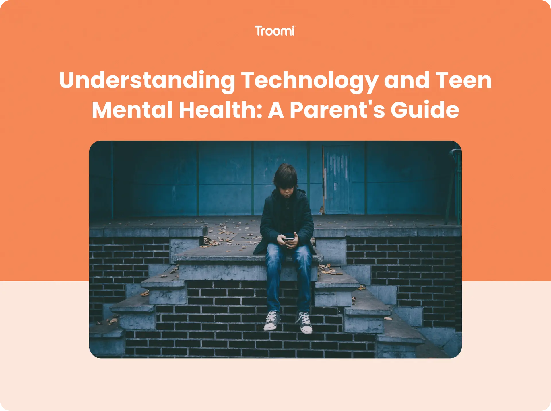 A teenager sits alone on concrete steps, looking at their phone. The background is a dimly lit urban setting. The orange and beige top half of the image displays the text: Understanding Technology and Teen Mental Health: A Parents Guide by Troomi.