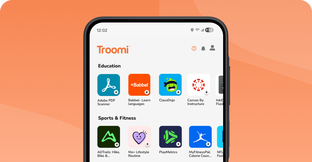A smartphone screen displays the Troomi app with various education and fitness apps, including Adobe PDF Scanner, Babbel, Canvas, and MyFitnessPal, against an orange background.