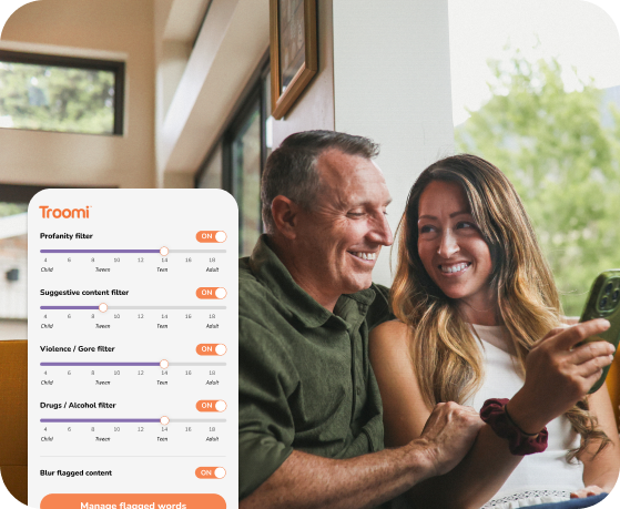 A man and woman smile while looking at a phone together. Beside them is an app screen showing content filters for profanity, suggestive content, violence, and drugs/alcohol, all set to On.